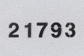 Black Number 21793 on the white wall. Spray paint.two hundred and one  thousand seven hundred and ninety threetwo hundred and one thousand seven  hundred and ninety three Background Stock Photos | Creative